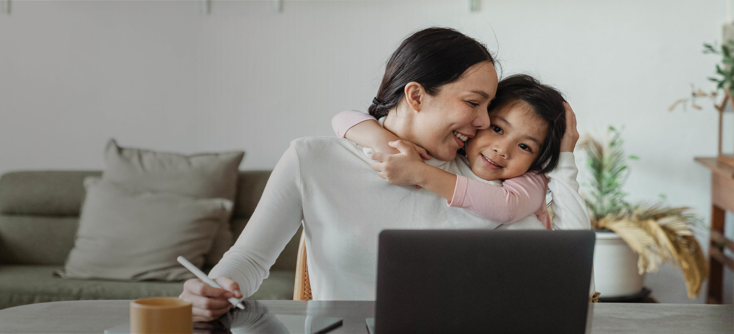 Women Working with Young Daughter